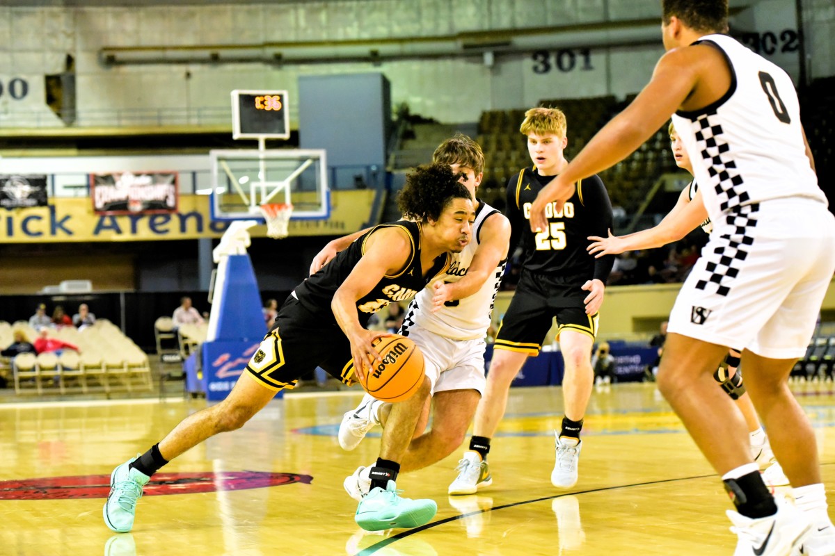 Caddo senior guard DJ Dill drives toward the basket during the Bruins' Class A semifinal win against Seiling on March 1, 2024.